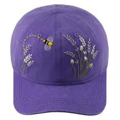 a purple hat with a bee on it and lavender flowers in the front, embroidered onto the side