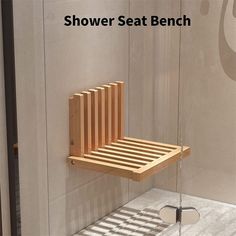 the shower seat bench is made out of wood and has been designed to look like a slatted chair