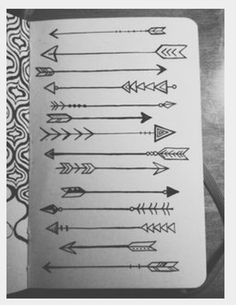 an open notebook with arrows drawn on it