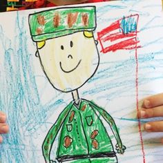 a child's drawing of a soldier with an american flag on his hat and green uniform