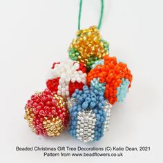 beaded christmas tree decorations in different colors