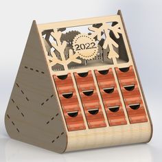 a wooden calendar with twelve days on it