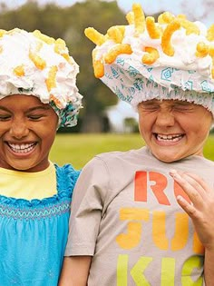 two children wearing hats with the words fun boredom busters on them and an orange background