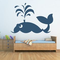 a wall decal with an image of a fish and water splashing from it's mouth