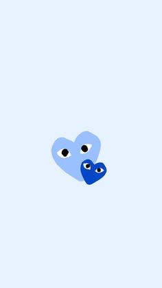 two blue hearts with eyes are in the sky