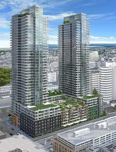 an artist's rendering of two high rise buildings in the middle of a city