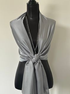 Beautiful silk and poly blend scarf/wrap/shawl. Feels and looks like natural silk. Whether it's a formal event, a casual outing, or a special occasion, our scarf/wrap/shawl is designed to flow and drape beautifully, adding a touch of elegance to your look. Designed with weddings and formal occasions in mind, our scarf/wrap/shawl is the perfect accessory for the bride, mother of the bride, maid of honor, bridal party, or guest, adding a touch of sophistication to any outfit. Length 74" X Width 40" or 188 X 102 cm This scarf is available in 21 colors. White, beige, champagne, gold, peach, dusty rose, pink, coral, orange, red, cranberry, plum, aquamarine green, emerald green, teal, indigo blue, royal blue, navy blue, grey, chocolate and black. A fashionable and versatile shawl that will eleva Beige Champagne, Satin Scarf, Satin Bridesmaid Dresses, Wrap Shawl, Coral Orange, Pink Coral, Natural Silk, Formal Attire, Green Emerald