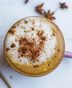 an overhead view of a drink with cinnamon sprinkles