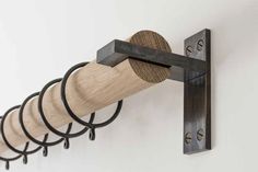 a wall mounted wine bottle rack with six corks