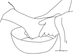 a person holding their hand over a bowl