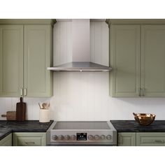 a stove top oven sitting inside of a kitchen next to green cupboards and counter tops