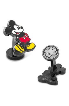 two mickey mouse cufflinks are shown in black and white, one is red