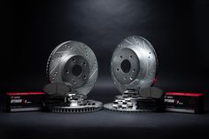 two front brake discs and one rear brake disc are shown in this image, with the other