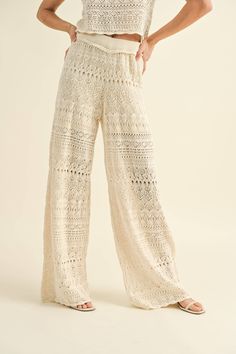 Create a buzz with these stunning crochet knit wide leg pants! Mix and match with the Dobie Ave Crochet Knit Tank or your favorite summer top <3 DETAILS:• 100% cotton• Elastic stretch waist with raw edge• Lined on top portion of pants• Hand wash• Model is in size small. She is 5' 7.5" | Bust: 175.3cm | Waist: 24" | Hips: 34" Cheap Summer Bottoms With Lace Trim, Cheap Stretch Bottoms With Lace Trim, Cheap Feminine Bottoms With Lace Trim, Luxury Wide Leg Pants With Lace Trim, Luxury Fitted Bottoms For Vacation, Luxury Sheer Summer Pants, Luxury Lace Women's Bottoms, Luxury Lace Trim Fitted Sets, Luxury Fitted Lace Trim Sets