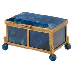 a blue and gold box sitting on top of a table