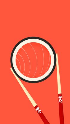 two chopsticks and a bowl on an orange background