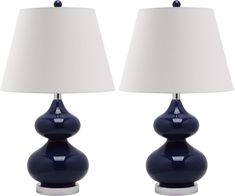 two blue lamps sitting next to each other