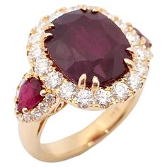 GIA Certified Unheated Ruby 7.57 carats, Ruby 0.80 carat and Diamond 1.25 carats Ring set in 18K Rose Gold Settings Width: 1.6 cm Length: 1.8 cm Ring Size: 53 Total Weight: 11.06 grams "We first opened doors in 1980 when it was then situated in the vicinity of the Victory Monument; a small and modest storefront with a couple of counters. From its humble beginnings to where it stands today, our company has proven its abilities as a jeweler. Since the beginning, we have been supplying fine quality Ruby Diamond Rings, Diamond Ring Settings, Ruby Rose, Ruby Diamond, Cocktail Rings, 18k Rose Gold, Ring Sets, Monument, Diamond Ring