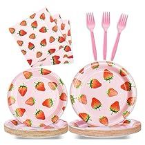 a set of pink strawberries plates, forks and napkins with matching utensils