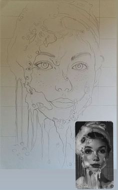 a drawing of a woman's face is shown