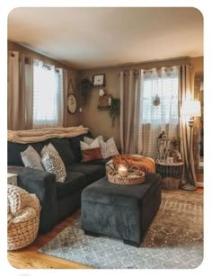 a living room filled with furniture and pillows