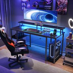 a gaming room with a computer desk and chair