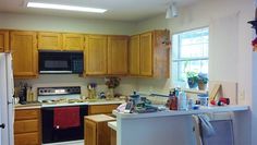 the kitchen is clean and ready for us to use in its new owner's home