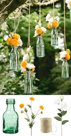 flowers in glass bottles hanging from a tree