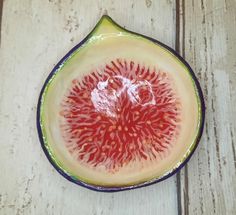 a close up of a piece of fruit on a table