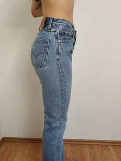 Iconic vintage Levis 501. Made in USA 90s.  Light blue wash. Straight leg. Buttonfly. Size: W28 L28 Measurements: Waist: 36cm, 14,1" Rise: 28cm, 11" Hip: 53cm, 20,8" Inseam: 70cm, 27,5" Knee: 20cm, 7,8" Leg opening: 18cm, 7" Beautiful vintage condition. Frayings and two not noticeable stains!! 10/8!  Material: 100% cotton. For best fit, please compare measurements to an item you already own. Beautiful vintage condition.  *RETURNS NOT ACCEPTED (Please check all measurements before buying vintage Levis 501 90s, Different Jeans, Levi 501 Jeans, Levis 501 Jeans, Vintage Levis Jeans, Vintage Levis 501, 501 Jeans, Levi Jeans 501, Denim Style