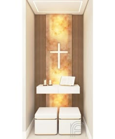 a white bathroom with a cross on the wall and two stools in front of it