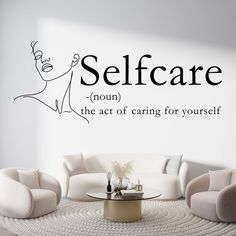 a wall decal with the words self care on it