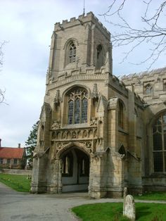 an old stone church with a large tower