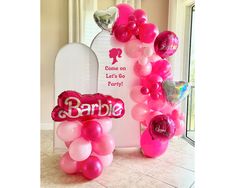 balloons and decorations for a barbie birthday party