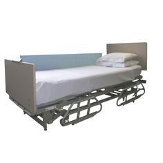 a bed that is attached to the side of a metal frame with mattresses on it