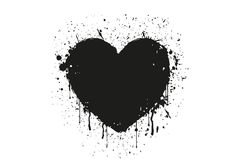 a black heart with splattered paint on it