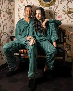 Petite Plume wishes you a “bonne nuit,” and in their luxury sleepwear, it’s hard not to oblige. Crafted in exquisite cotton, with the finest attention to detail, Petite Plume delivers the utmost comfort and sophistication. Accented with contrast piping and finished with pearl buttons, the Men’s Luxe Pima Cotton Green Stripe Pajama Set features specially brushed cotton so that every wash brings more coziness and better sleep. Product Details 100% cotton. Care Instructions Machine wash cold with l Plaid Matching Pajamas, Family Pajama Sets Green, Green And White Striped Christmas Pajamas, Cheap Cotton Holiday Sets, Family Pajama Sets Pretty Little Deal Store, Luxury Green Men's Sets, Bearish Pajamas, Luxury Fitted Men's Sets, Luxury Men's Sets