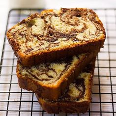 three slices of cinnamon swirl bread on a cooling rack