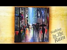 a painting of people walking in the rain with umbrellas on a wooden wall above them