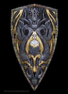 an intricately designed shield with two snakes on it