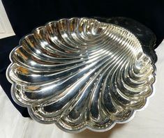 a silver platter sitting on top of a table