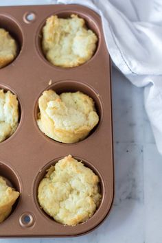 muffins in a baking pan on a table