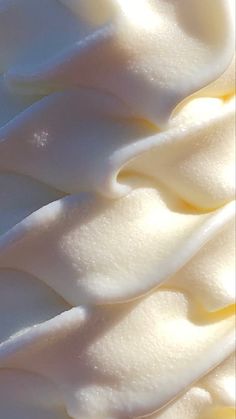 an image of some white icing on top of each other in close up view