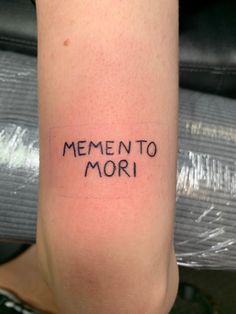 A fresh tattoo on my arm that says “Memento Mori” Mac Miller Memento Mori Tattoo, Mac Miller Memento Mori, Mac Miller Momento Mori, Momento Mori Tattoo Mac Miller, Mac Miller Tattoos Ideas Small Lyrics, Mac Miller Tribute Tattoo