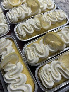 four trays filled with lemon custard dessert