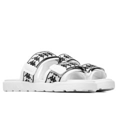 Utilizing Kappa’s signature Omini logo, the 222 Banda Aster 1 is a comfortable slip-on that can be easily implemented into everyday outfits. Constructed with heavy-duty nylon, a PVC outsole provides its comfortable where while strap closures can be tailored to your desired fit. The printed logo can be seen throughout emphasizing a monochromatic finish. Nylon upper PVC outsole Omini logo print Adjustable straps All sizes are listed in U.S. Men's sizing unless stated otherwise Style no: 304T5Z0-A1 White Non-slip Sandals For Streetwear, Black Adidas Logo Sandals, Pink Kappa Slides, Black Slip-on Sport Sandals For Streetwear, Black Kappa Slides, Things I Need To Buy, Black 13, S Signature, Fit Ideas