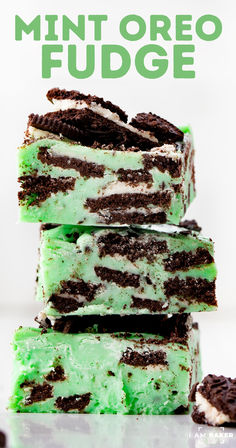 mint oreo fudge ice cream sandwiches stacked on top of each other