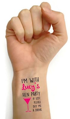 a hand with a tattoo that says i'm with juicy s hen party if lost please buy me a drink