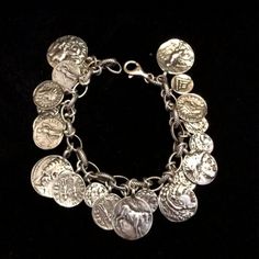 Silpada-Sterling Silver Oxidized Roman Coin Cha Cha Charm Bracelet B1624 - 8in Designer: Silpada Material: Sterling Silver Hallmarked: Yes Age: Modern Style: Charm Bracelet Weight: 66g 8 Inches Long Excellent Pre-Loved Condition-Gently Worn By A Single Owner No Silpada Box Or Pouch Item Comes From A 100% Smoke Free Home Coin Charm Bracelet, Indie Jewelry, Roman Coins, Silpada Jewelry, Womens Jewelry Bracelets, Modern Style, Coin, Charm Bracelet, Pouch