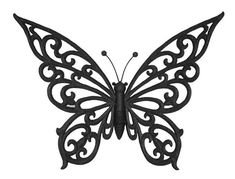 a black metal butterfly on a white background